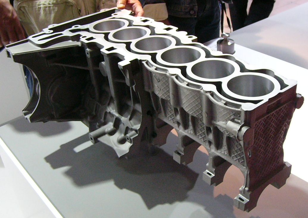 An engine block with aluminium and magnesium die castings
