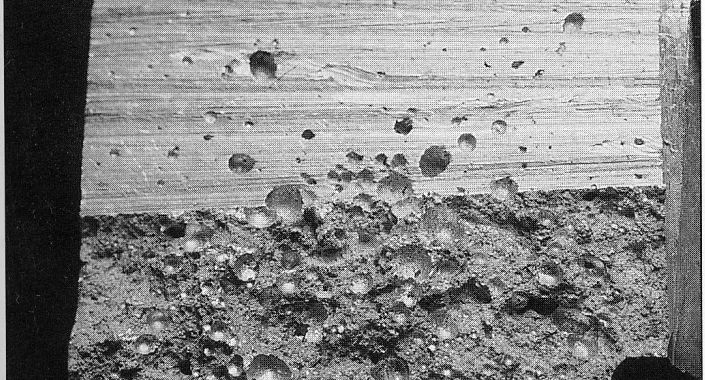 Fig. 1.1 Gas porosity where the bubbles have been flattened by the pressure.