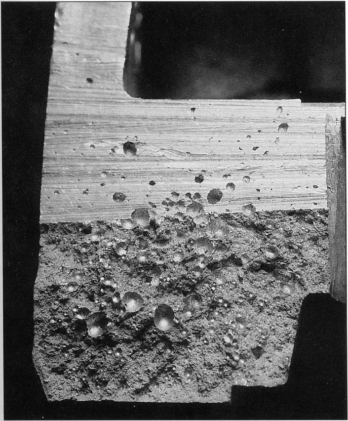 Fig. 1.1 Gas porosity where the bubbles have been flattened by the pressure.