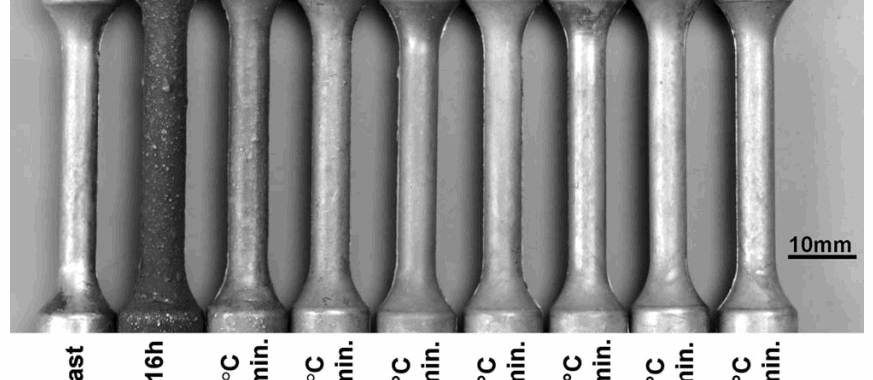 Fig. 2—Surface appearances of the alloy 360 in the as-cast condition and after different solution-treatment schedules. Metal velocity at the gate was 26 m/s.
