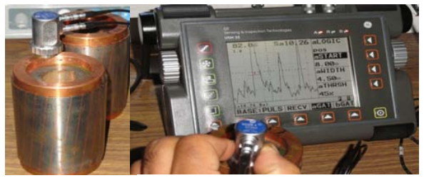 Fig. 4 Flaw detection on end rings using ultrasonic tester