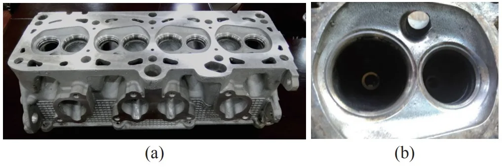 Fig. 8. (a) Engine cylinder head made of JDM1 magnesium alloy and
(b) surface morphology of the combustion chamber after road tests over
9000 km.