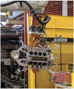 Figure 14: Biscuity, runner, gating, and venting system on casting (photo permission from Mercury Marine)