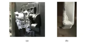 Figure 2: (a) An example of sticking. Both images courtesy of Mercury Marine. (b) An example of soldering on a die insert.