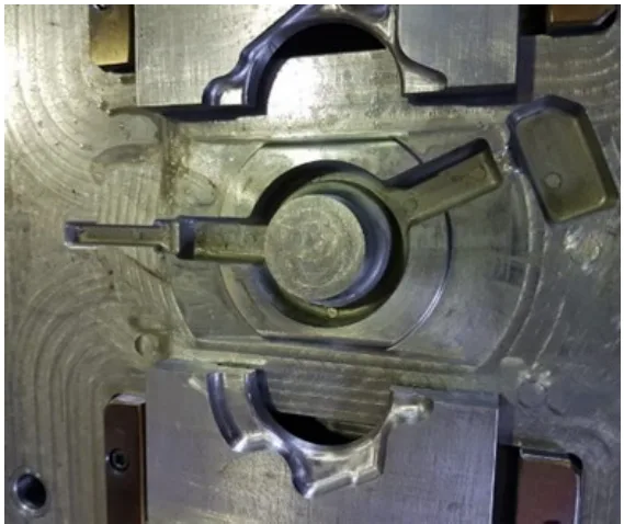 Figure 2.2. Injection mold fixed side manufactured for salt core.