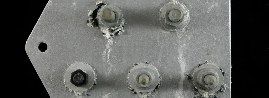 Figure 8 Appearance of fastened AE44 plates pretreated with fluorozirconate and a metallic-looking epoxy-based powder coat.
