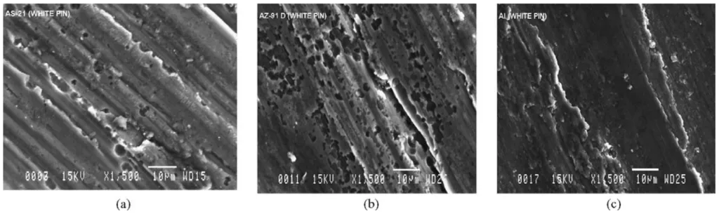 Fig. 7. SEM micrographs for: (a) magnesium alloy AS21; (b) magnesium alloy AZ91D; (c) aluminum alloy Al-CA 313.