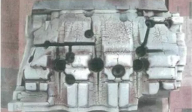 Figure 1: Image of Die in the actual die-casting process, which has cracks (red lines) on the surface.