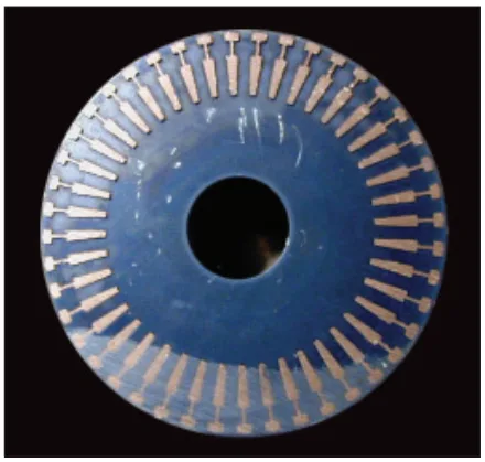 Fig. 9 – Cross-section of rotor showing copper filling the slot openings by the pressure.