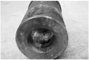 Figure 1. Hole in the material dropping area.