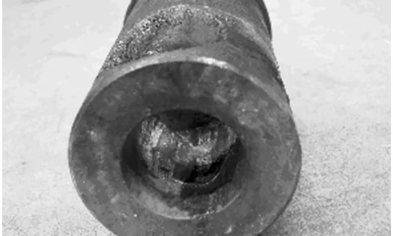 Figure 1. Hole in the material dropping area.