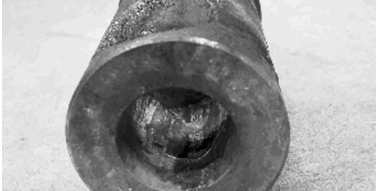 Figure 1. Hole in the material dropping area.