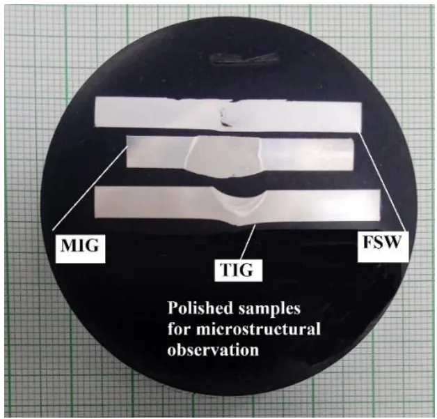 Fig. 9 Polished and etched surfaces of three welded plates