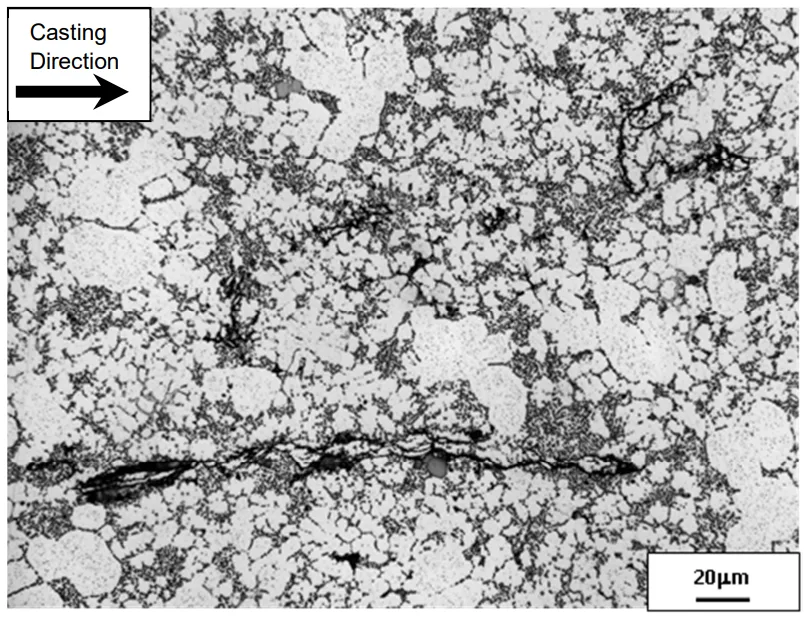 Figure 4. Examples of continuous and discontinuous defects present in high pressure diecast plates, where the defects orientation aligns with the direction of metal flow.