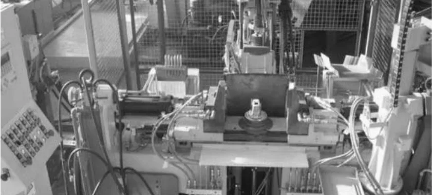 Fig. 2. Permanent mould casting machine for casting single pistons [8]