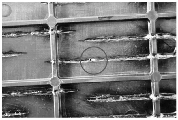 Fig. 3. Crater in weld of contaminated materials.