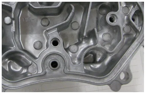 Figure 9 A part of Al die cast product where internal soundness was improved by the application of DHA-THERMO core pins.