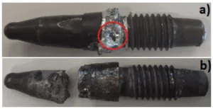 Figure 2. External aspect of some nozzles removed from the high-pressure die-casting equipment after severe damage: (a) exhibiting a hole; (b) or even being broken