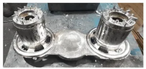 Fig. 4. Rotor squirrel cages after casting with the casting grid