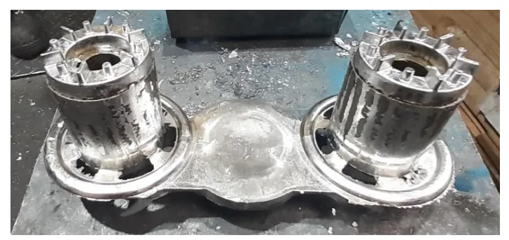 Fig. 4. Rotor squirrel cages after casting with the casting grid