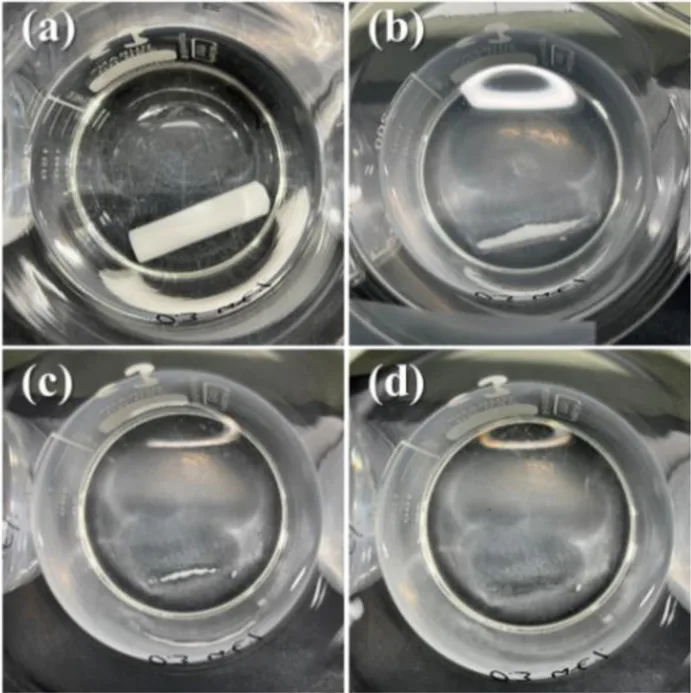 Fig. 5. Water soluble experiments of the KCl-based salt core reinforced by 0.3 wt% glass fiber in room temperature: (a) 0 h, (b) 2 h, (c) 4 h, (d) 6 h.