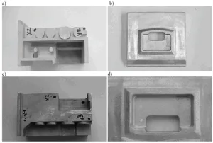 Fig. 1. Parts of housing used for anodizing in the state before anodizing: a) AlSi12, b) AlSi8 and after anodizing: c) AlSi12, d) AlSi8