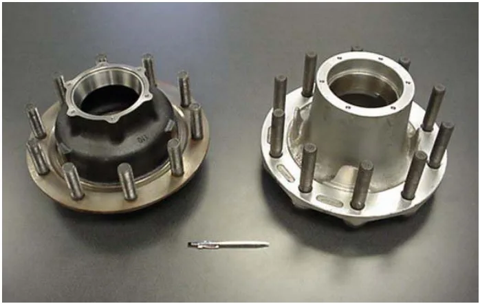 Figure 12: The ADI Dura-Light® hub on the left replaced the permanent mold cast aluminum hub on the right with a 50% savings in embodied energy and a 2% weight reduction.