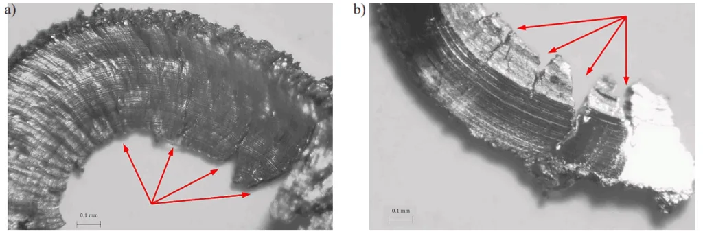 Fig. 5. Cracks on the inner (a) and outer (b) surface of the chip – turning of sintered material