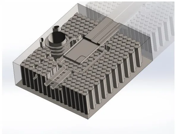 Figure 3.19 : Transparent top isometric view of cavity with honeycomb structure showing depth of the honeycomb
cells around cooling channels. Transparent regions are solid structure.
