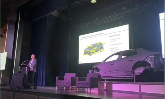 igure 1. Mark Butterfield, president of Metal Exchange Corporation, speaks at the Aluminum Technology Forum in Detroit, which provided a venue for aluminum companies and OEMs to speak on the use of aluminum in vehicles.