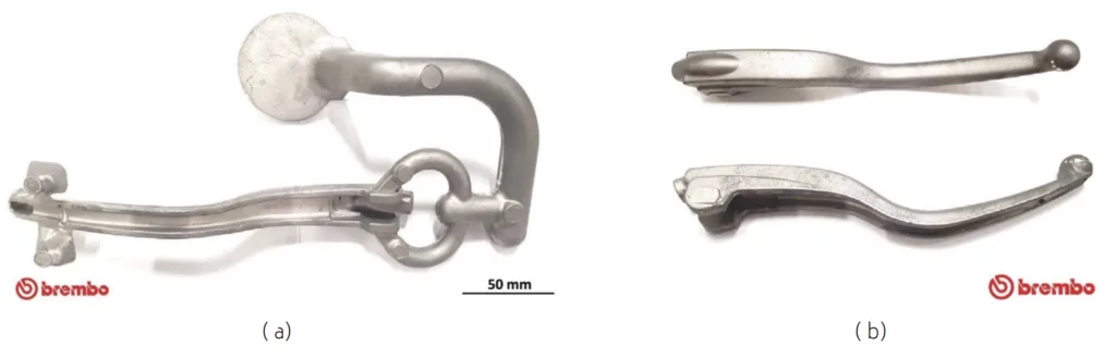 Fig.4 - a) The die-cast brake leverage with in-gate channels and sprue; b) die-cast brake leverage after re-moving sprue and in-gate channels.