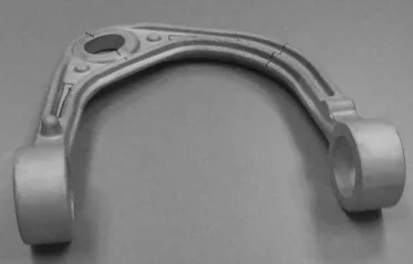 Fig. 9. A prototype magnesium control arm made by GM using low pressure die casting process.